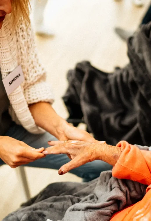 an image of a woman caring for an elderly lady