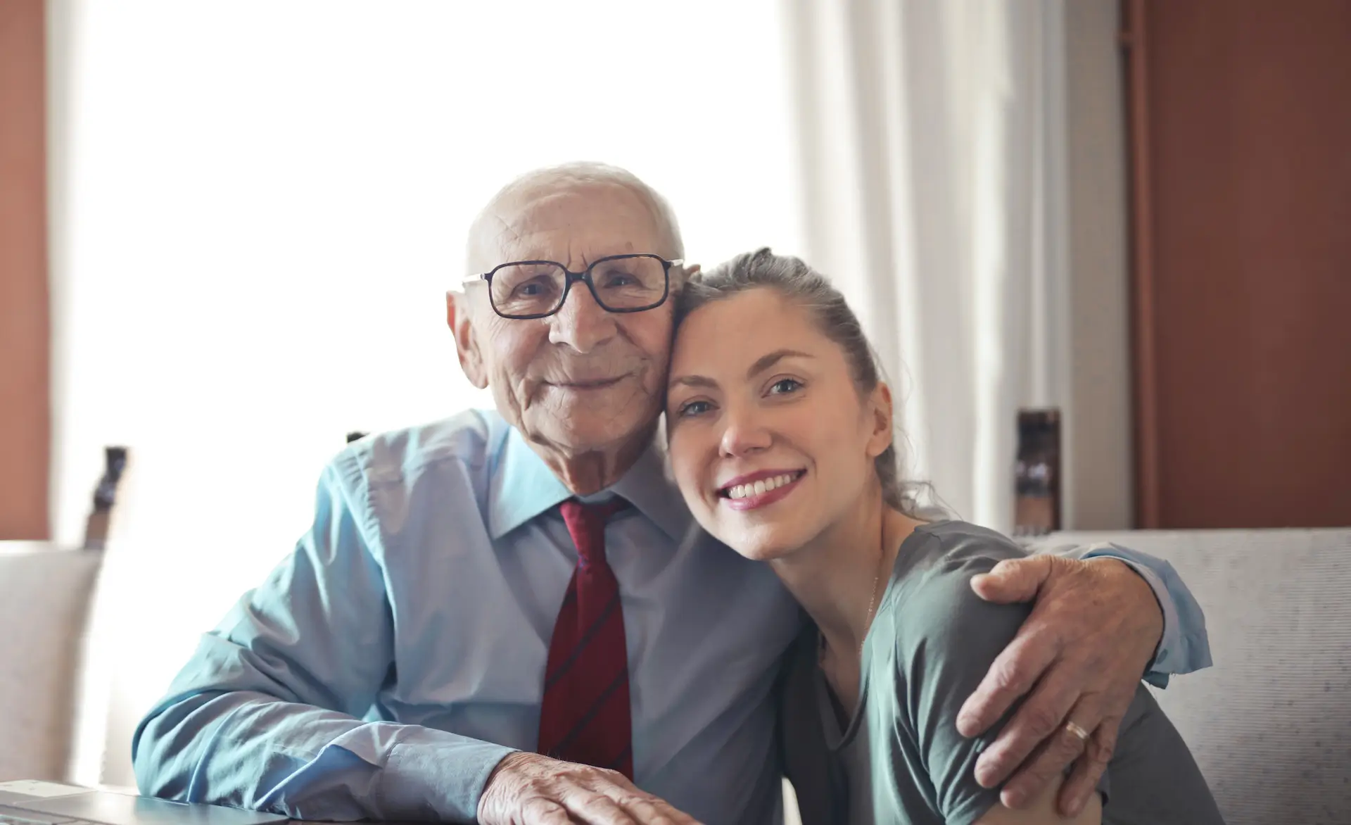 a care worker with a patient showing compassion