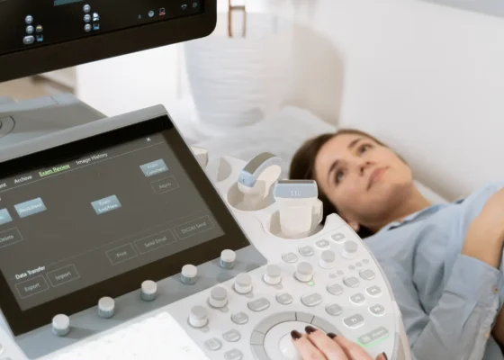 an image of a pregnant woman receiving a pregnancy scan