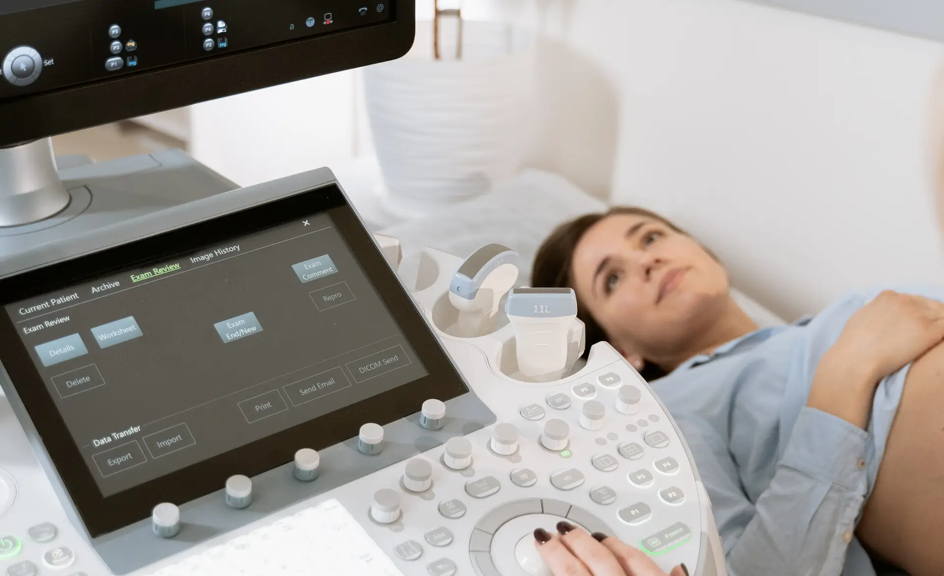 an image of a pregnant woman receiving a pregnancy scan